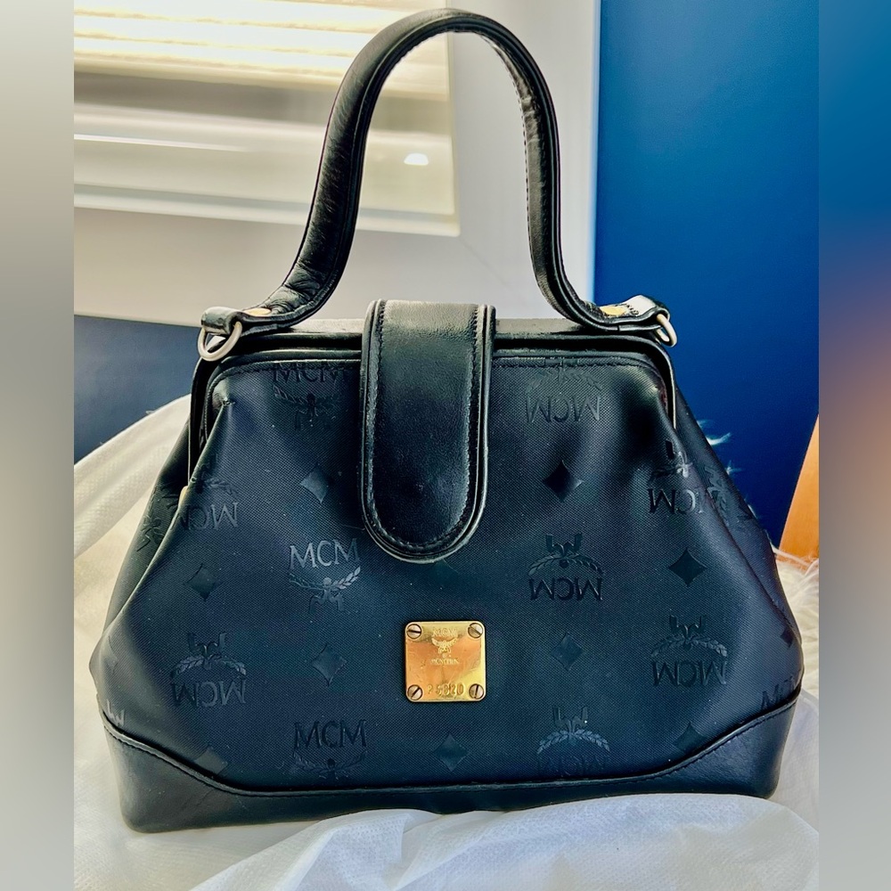 Vintage MCM black monogram Visetos doctor-style top handle gold-toned hardware.